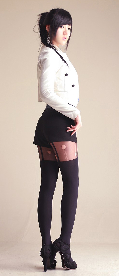Brunette Asian Girl wearing Black Ripped Pattern Pantyhose